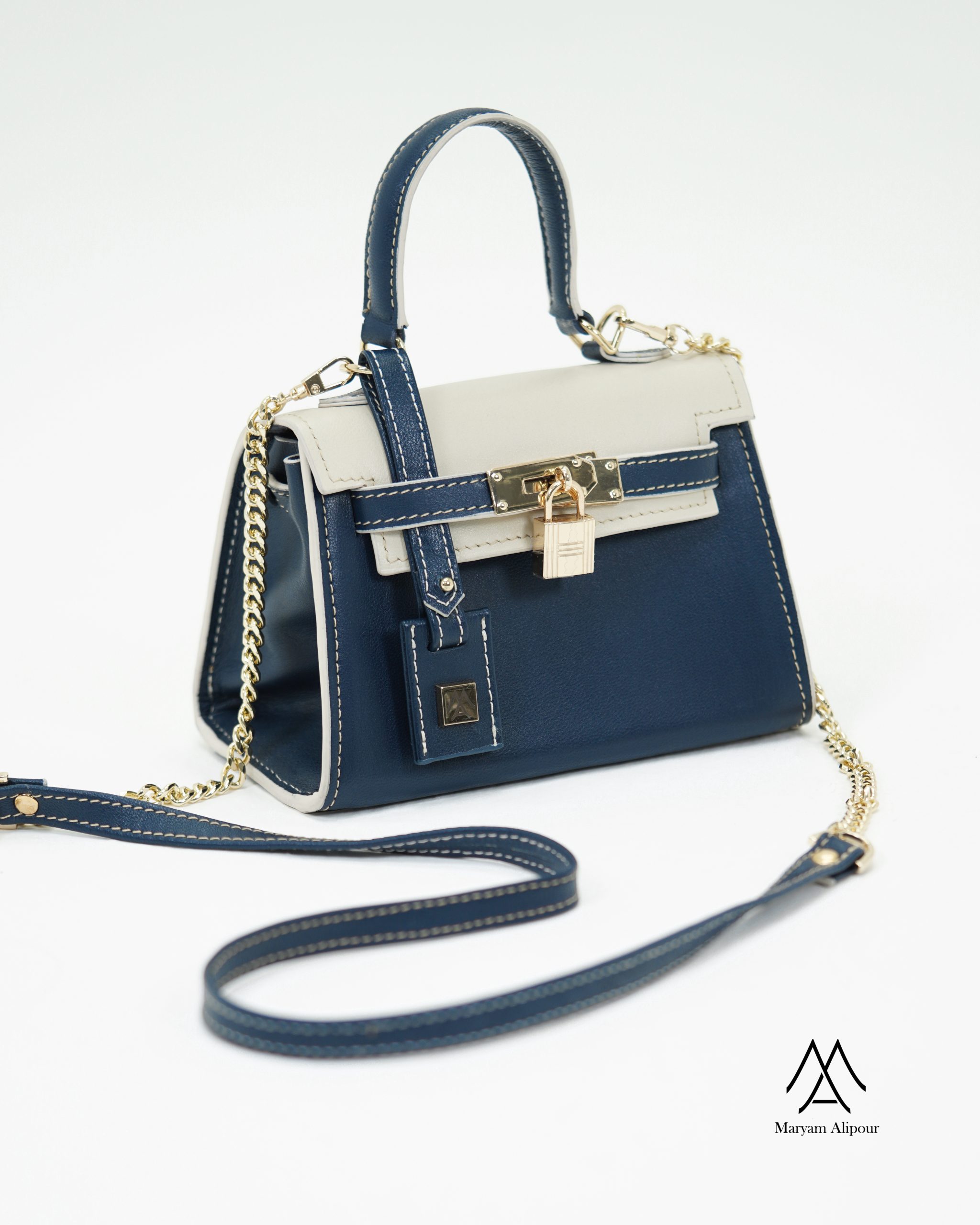 کیف آیرا کرم سرمه ای